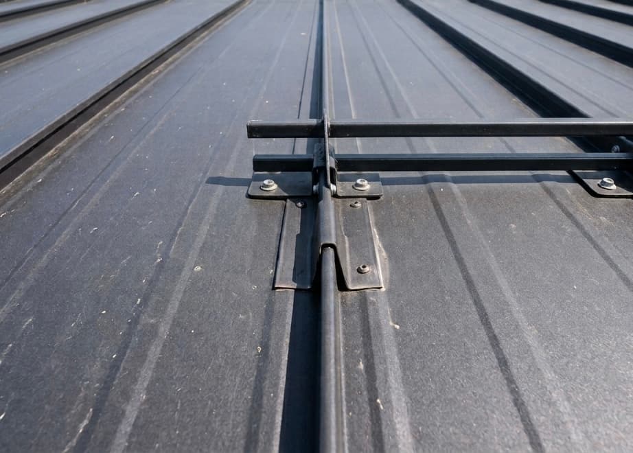 Standing seam metal roof with concealed fasteners